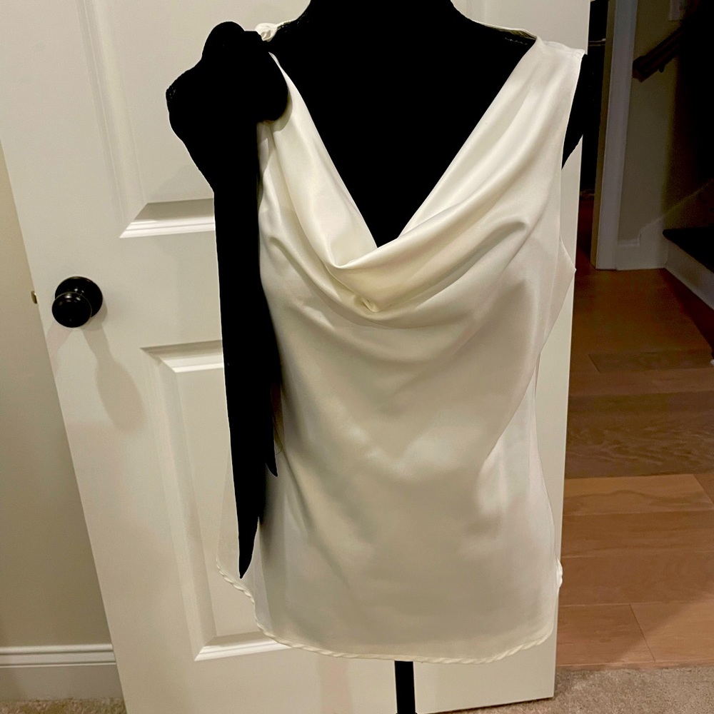 Cream colored silky top! Great condition only worn a couple of times.